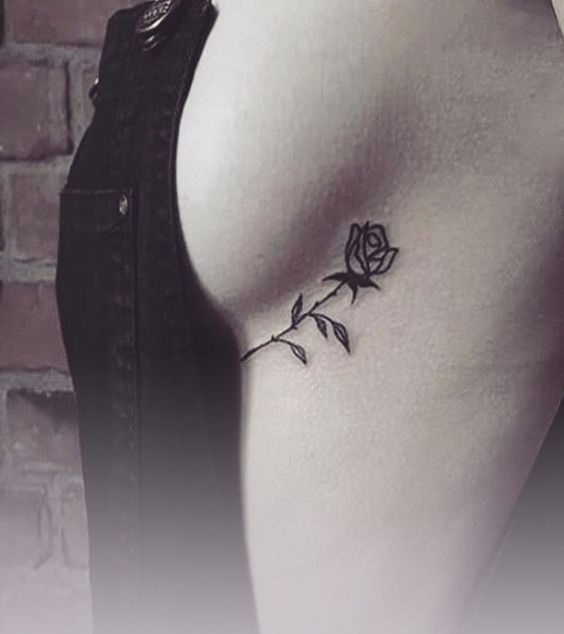 rose underboob tattoo
